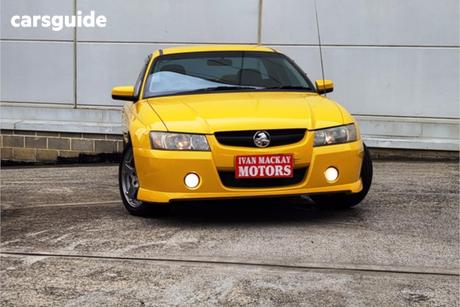 Yellow 2006 Holden Commodore Utility S