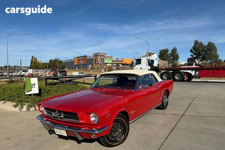 Red 1965 Ford Mustang Hardtop
