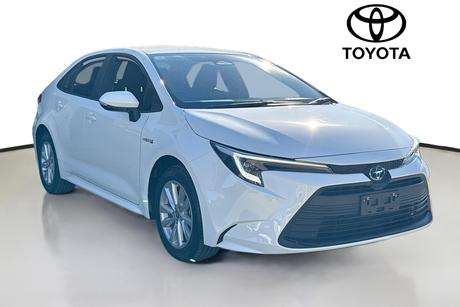 White 2024 Toyota Corolla Sedan Ascent Sport Hybrid