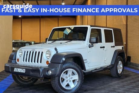 White 2009 Jeep Wrangler Softtop Unlimited Sport (4X4)