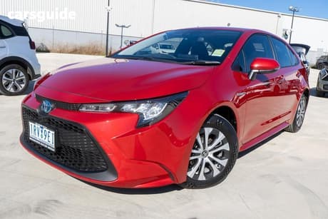 Red 2020 Toyota Corolla Hatchback Ascent Sport (Hybrid)