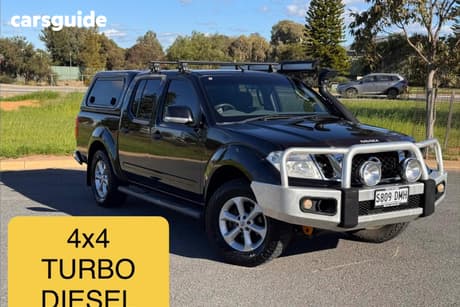 Black 2012 Nissan Navara Dual Cab Pick-up St (4X4)