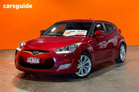 Red 2014 Hyundai Veloster Coupe +