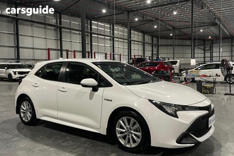 White 2023 Toyota Corolla Hatchback Ascent Sport Hybrid