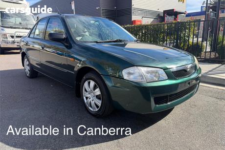 Green 1998 Mazda 323 Sedan Protege