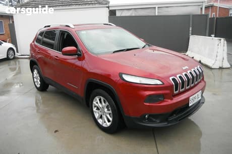 Red 2014 Jeep Cherokee SUV LONGITUDE (4X4)