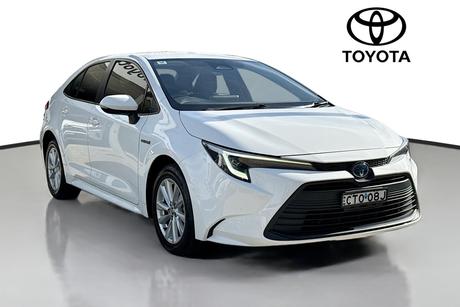 White 2023 Toyota Corolla Sedan Ascent Sport Hybrid