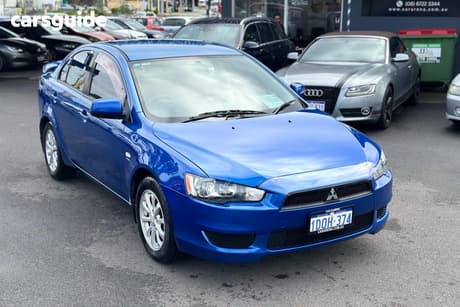Blue 2011 Mitsubishi Lancer Sedan Sx