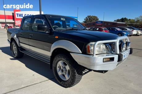 Black 2004 Nissan Navara Dual Cab Pick-up St-R (4X4)
