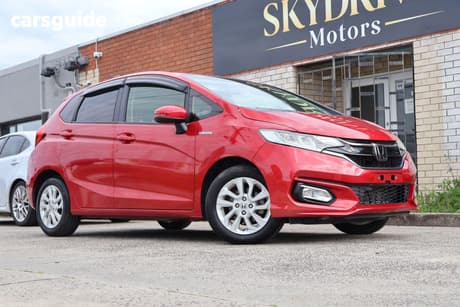 Red 2017 Honda Fit Hatch (HYBRID)