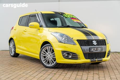 Yellow 2014 Suzuki Swift Hatchback Sport