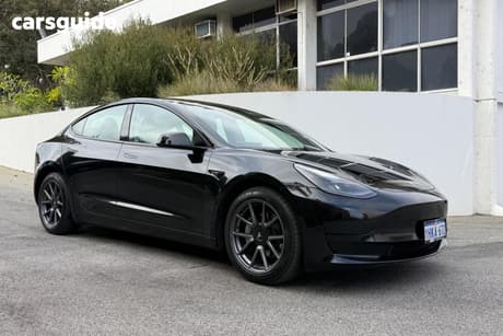 Black 2021 Tesla Model 3 Sedan Standard Range Rwd