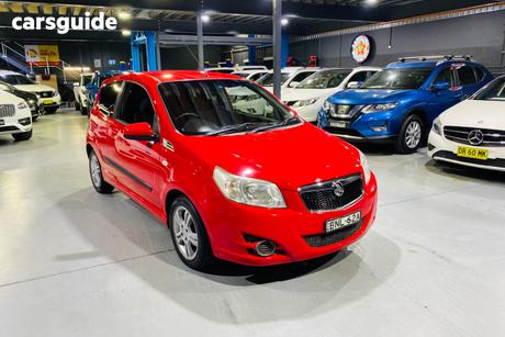 Red 2010 Holden Barina Hatchback