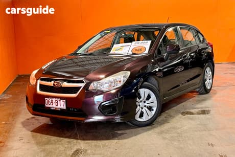 Purple 2013 Subaru Impreza Hatchback 2.0I-L (Awd)
