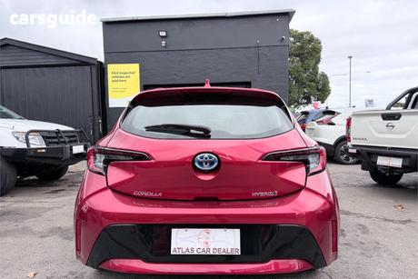 Red 2023 Toyota Corolla Hatchback Ascent Sport Hybrid