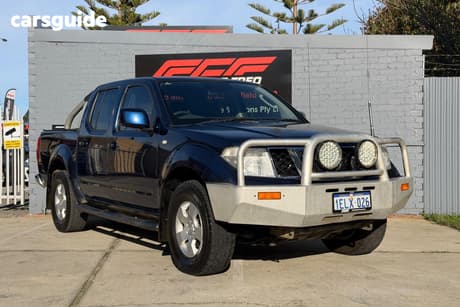Blue 2010 Nissan Navara Dual Cab Pick-up St (4X4)