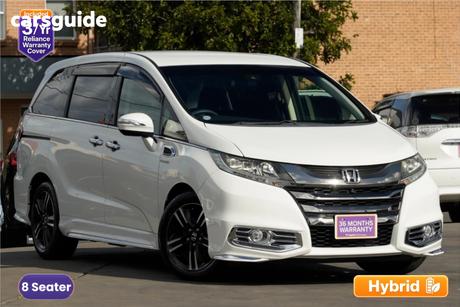 White 2017 Honda Odyssey SUV ABSOLUTE-SENSING (HYBRID)
