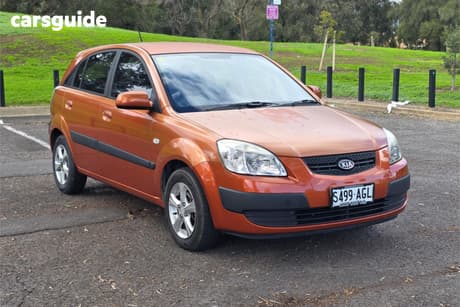 Orange 2009 Kia RIO Hatchback Lx