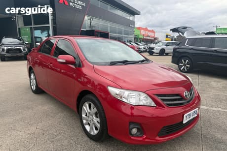 Red 2011 Toyota Corolla Sedan Ascent