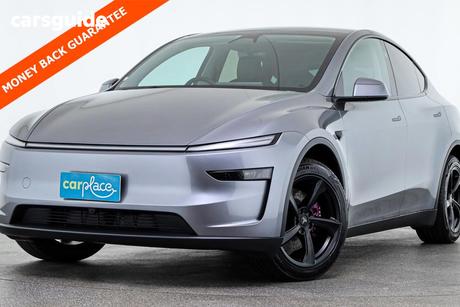 Silver 2025 Tesla Model Y Wagon Rear-Wheel Drive