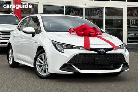 White 2025 Toyota Corolla Hatchback Ascent Sport Hybrid