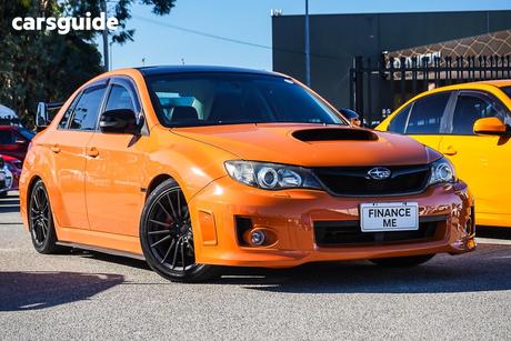Orange 2012 Subaru WRX Sedan Club Spec (Awd)