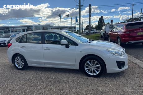 White 2014 Subaru Impreza Hatchback 2.0I (Awd)