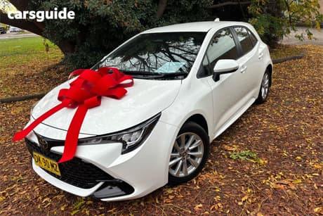 White 2024 Toyota Corolla Hatchback Ascent Sport