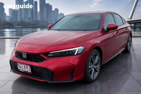 Red 2024 Honda Civic Hatchback E:Hev L