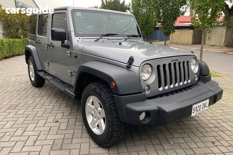Silver 2015 Jeep Wrangler Unlimited Softtop Sport (4X4)