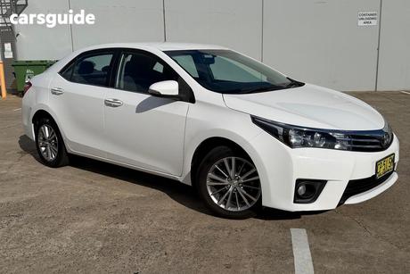 White 2014 Toyota Corolla Sedan Sx