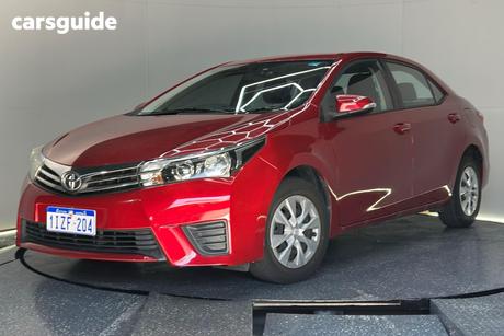 Red 2015 Toyota Corolla Sedan Ascent