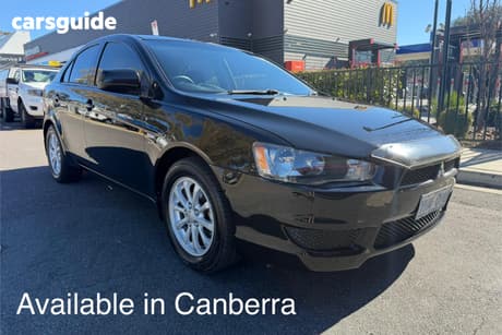 Black 2011 Mitsubishi Lancer Sedan Sx