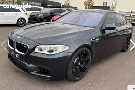 Grey 2014 BMW M5 Sedan