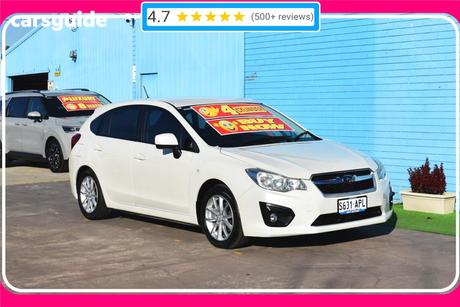 White 2012 Subaru Impreza Hatchback 2.0I-L (Awd)