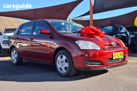 Red 2005 Toyota Corolla Hatchback Ascent Sport Seca