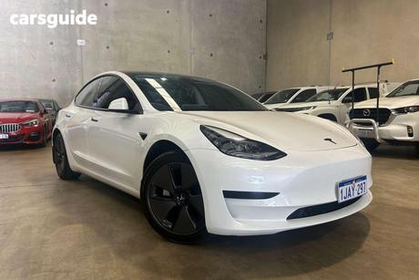 White 2021 Tesla Model 3 Sedan Standard Range Plus Rwd