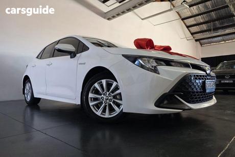 White 2023 Toyota Corolla Hatchback Ascent Sport Hybrid