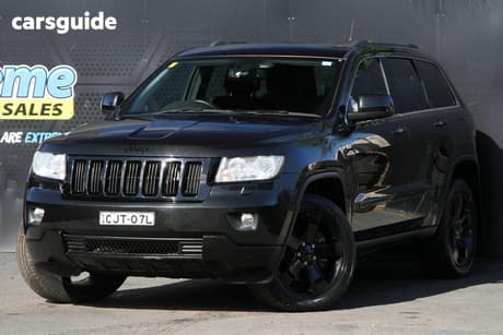 Black 2012 Jeep Grand Cherokee SUV LAREDO