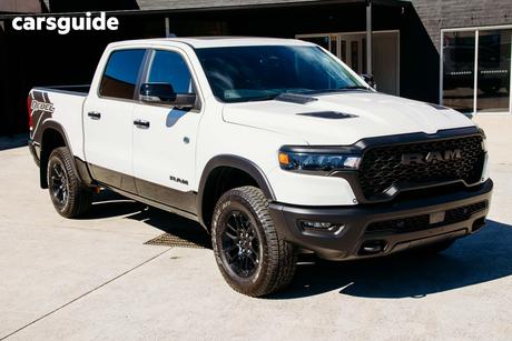 White 2025 RAM 1500 Crew Cab Utility Rebel Hurricane