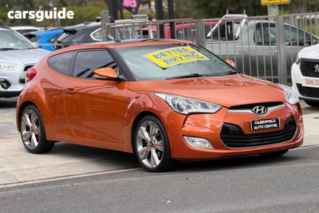Orange 2012 Hyundai Veloster Coupe +