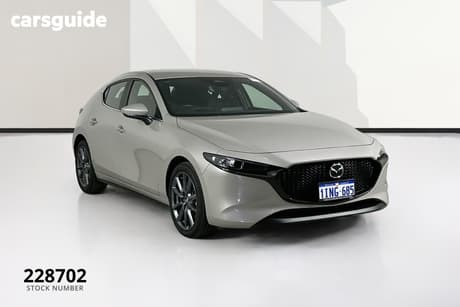 Gold 2024 Mazda 3 Hatchback G20 Evolve