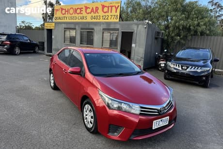 Red 2015 Toyota Corolla Sedan Ascent