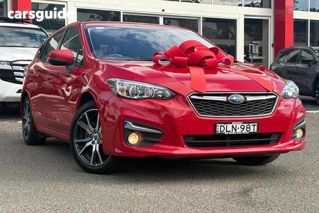 Red 2016 Subaru Impreza Hatchback 2.0P Premium (Awd)