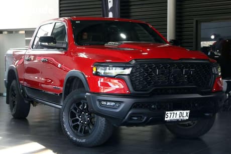 Red 2025 RAM 1500 Crew Cab Utility Rebel Hurricane
