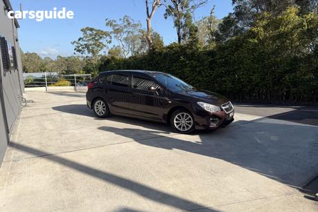Purple 2013 Subaru Impreza Hatchback 2.0I (Awd)