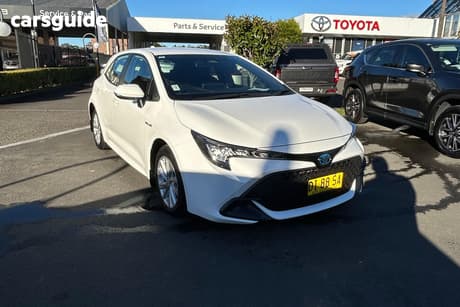 White 2023 Toyota Corolla Hatchback Ascent Sport Hybrid