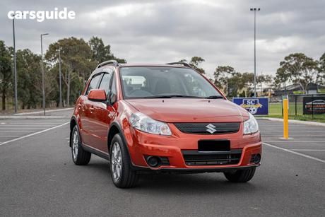 Orange 2008 Suzuki SX4 Hatchback 4X4