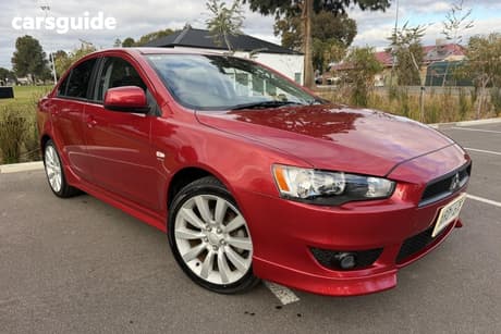 Red 2008 Mitsubishi Lancer Sedan Vr-X