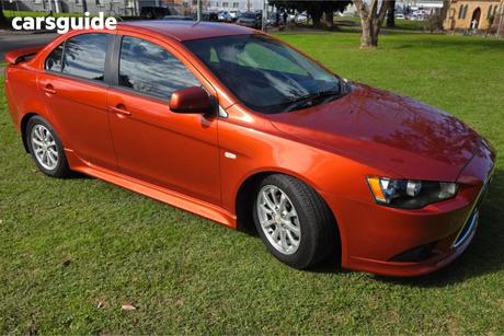 Orange 2012 Mitsubishi Lancer Sedan Es